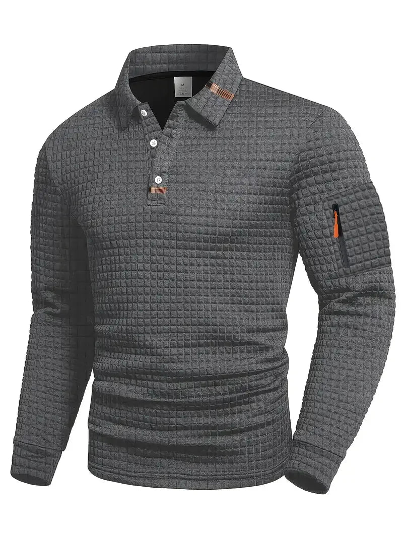 Close-up of a men's stylish textured long-sleeve polo shirt, featuring a unique geometric pattern.