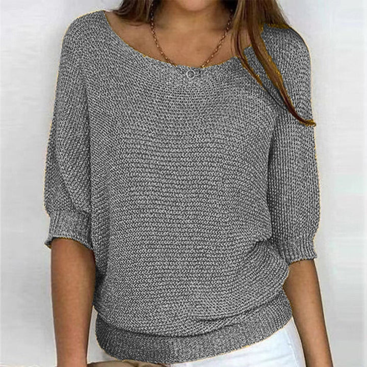 Stylish women's batwing sleeve sweater, oversized fit. Perfect for elegant fall & winter casual wear.