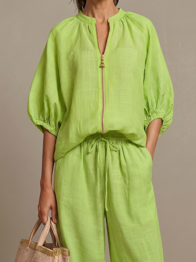 Versatile women's zip-front top, ideal for a relaxed two-piece outfit.