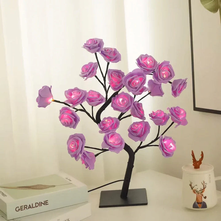 Decorative LED rose lamp providing warm ambient lighting in a cozy home corner.