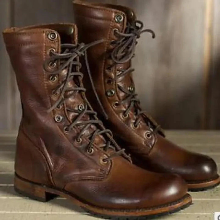 Comfortable women's dark brown leather lace-up boots, designed with a sturdy block heel & round toe for all-day wear.
