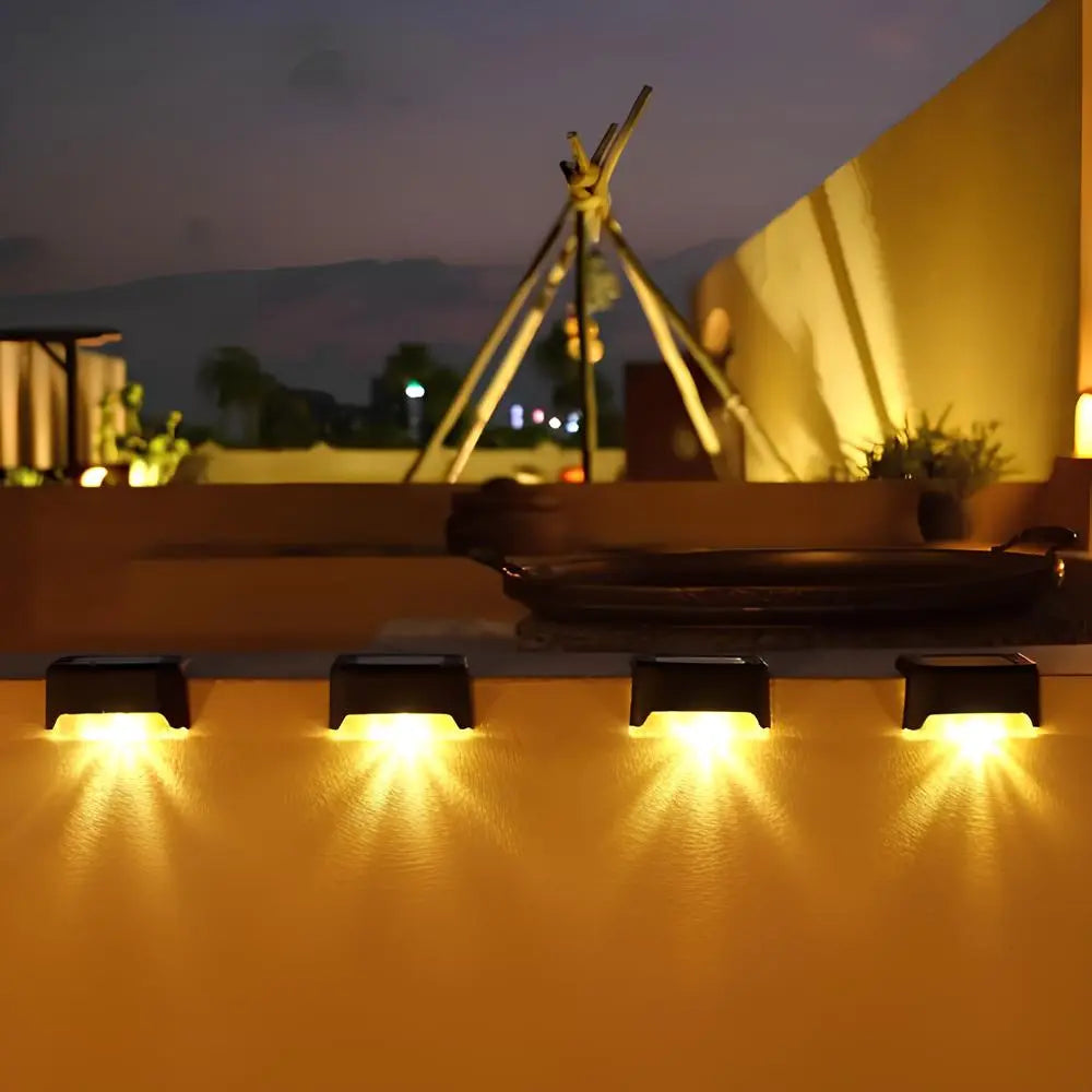 Auto dusk-to-dawn outdoor solar step lights, warm LED illumination.