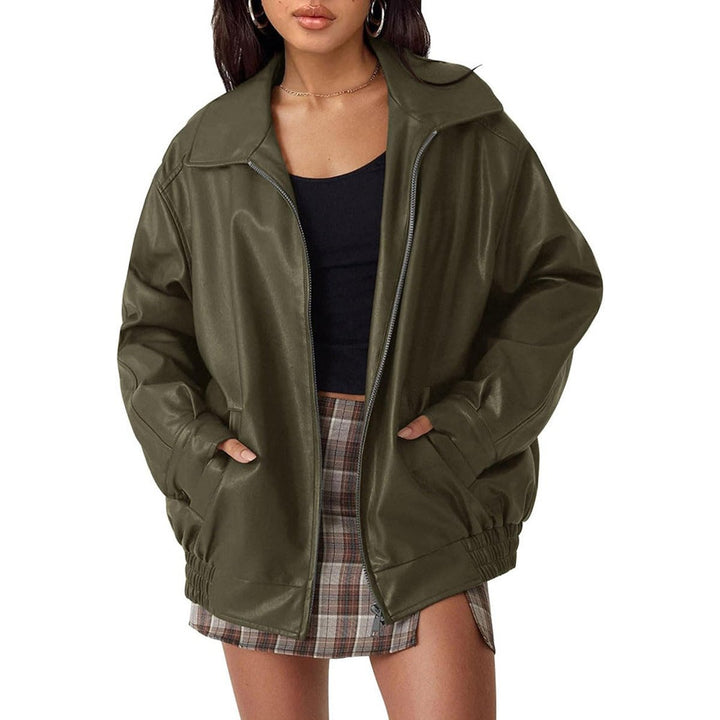 Chic women's oversized leather bomber jacket, perfect for trendy fall fashion and sophisticated looks.