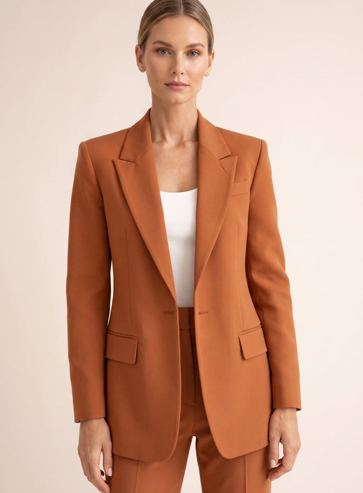 Women's sophisticated outfit: elegant blazer and flared trousers two-piece suit, perfect for professional attire.