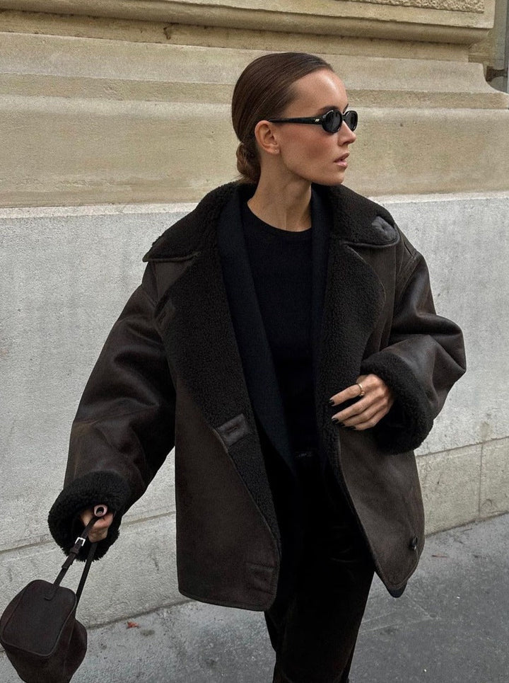 Elegant women's outerwear: a chic vintage jacket ensuring warmth and fashionable appeal.
