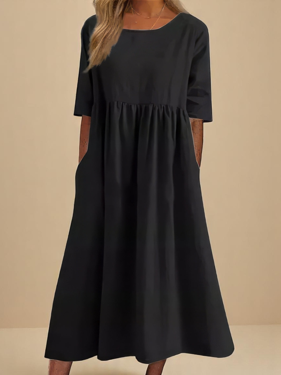 Casual everyday women's dress with mid sleeves and a relaxed fit, offering ultimate comfort and versatility.