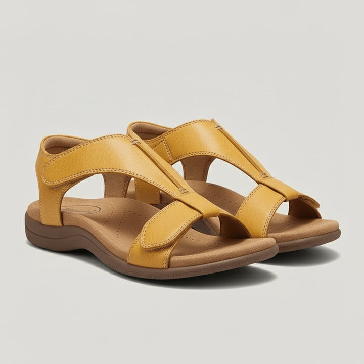 Stylish open-toe T-strap orthopedic sandals for women, providing excellent foot support.