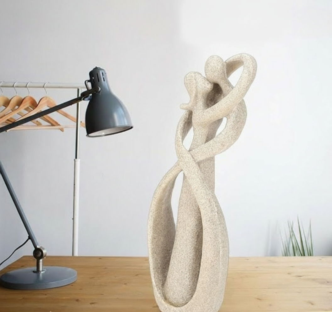 Elegant abstract love sculpture, a modern decorative figurine for contemporary home or office.