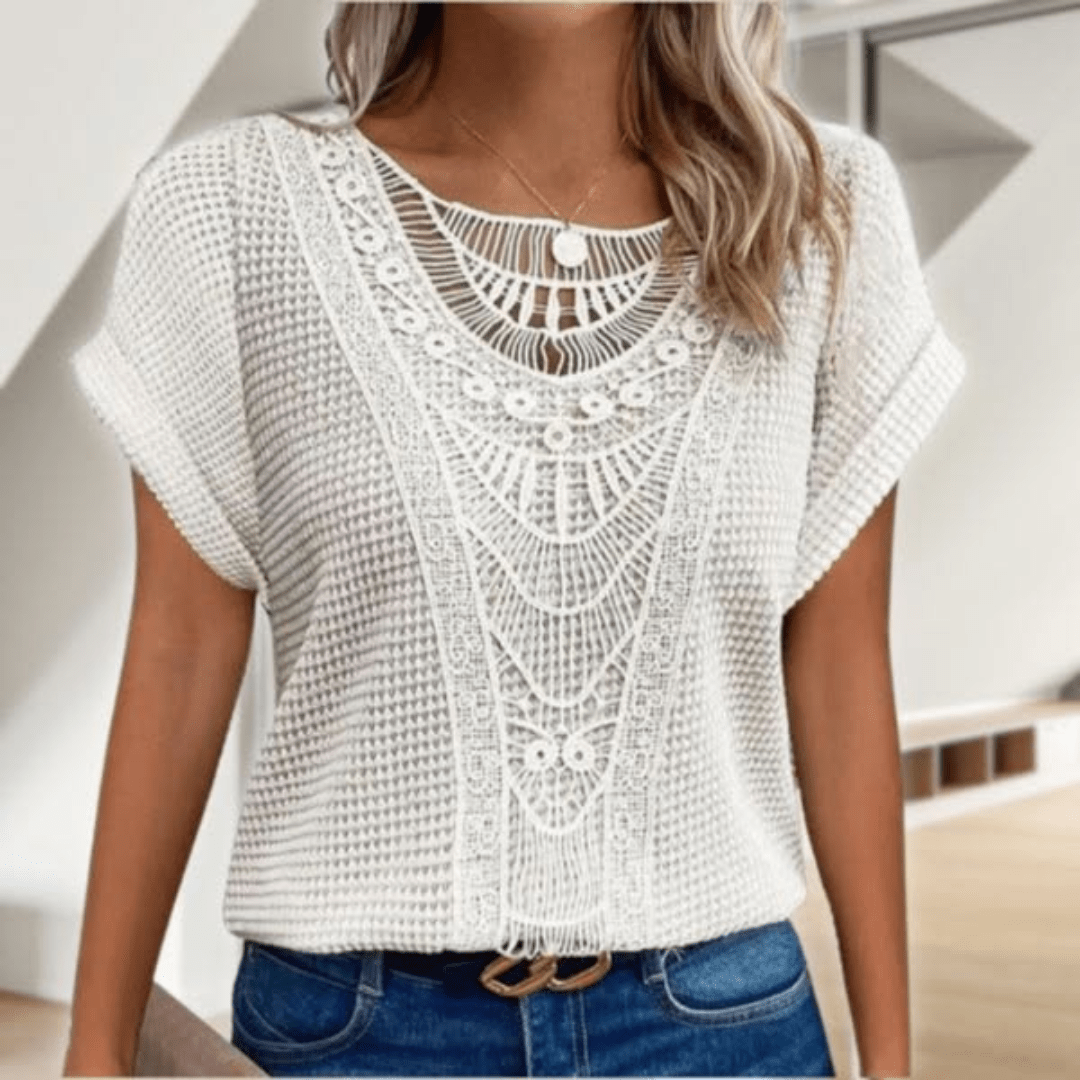 Chic women's vintage lace top, perfect for special occasions. Features intricate detailing.