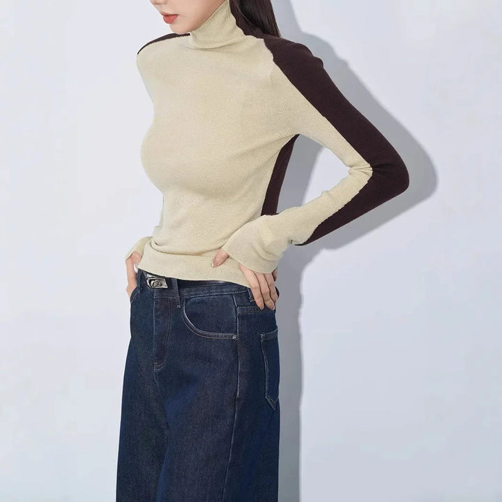 Casual chic women's mock neck knit sweater with unique contrast sleeves, a perfect stylish winter fashion top.