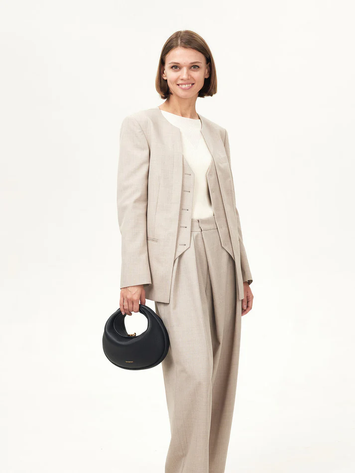 Versatile multi-strap women's everyday handbag. Chic synthetic leather converts to shoulder, crossbody, or clutch.