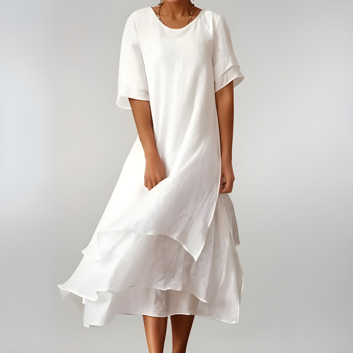 Pink women's maxi dress. Lightweight, comfortable, and elegant with a flowing silhouette for summer fashion.