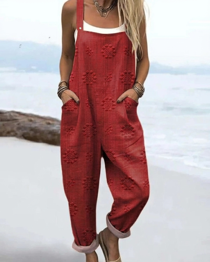 Chic women's Meadow Glow floral print wide-leg jumpsuit, showcasing its unique and vibrant summer style.
