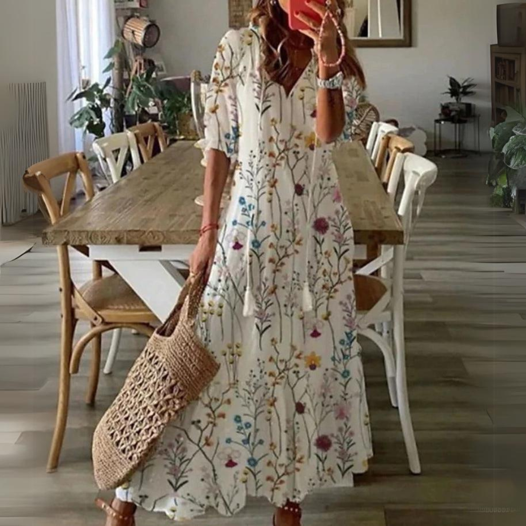 Women's elegant floral print maxi dress, short sleeve, V-neck. Perfect for summer, beach, or casual events.