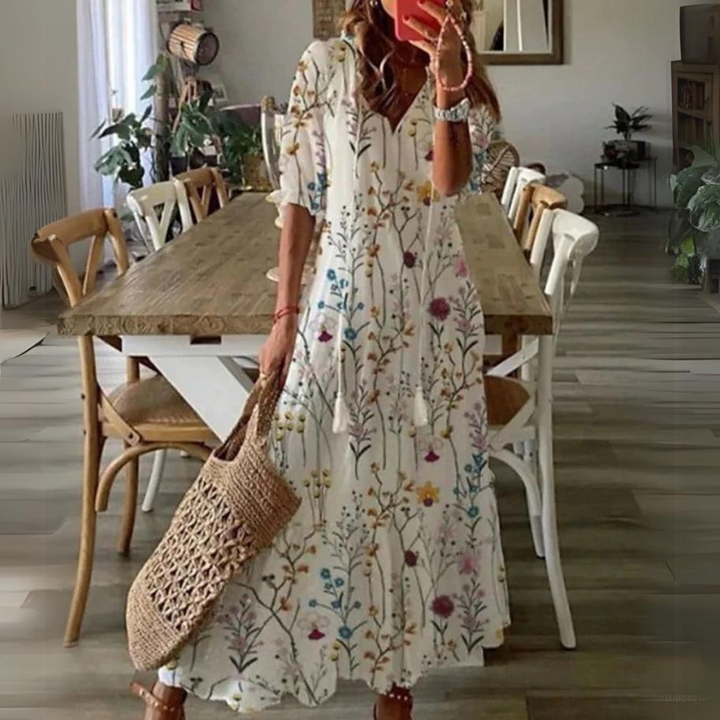 Women's elegant floral print maxi dress, short sleeve, V-neck. Perfect for summer, beach, or casual events.