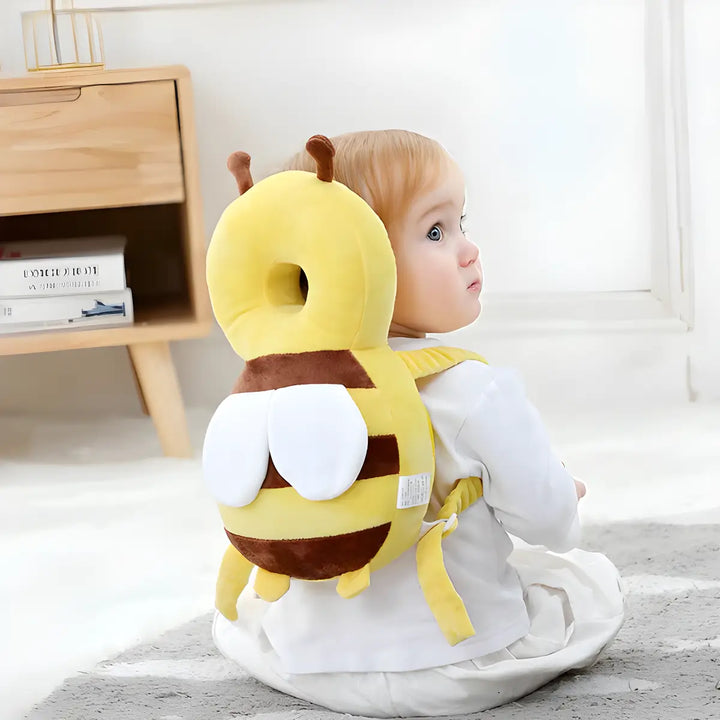 Plush unisex baby head protection cushion, soft pillow for infant safety during crawling, walking, and playtime.