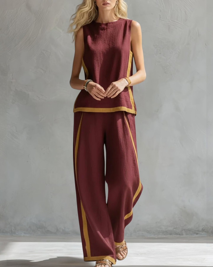 Chic ladies' sleeveless top & wide leg trouser set, combining comfort with elegant style.