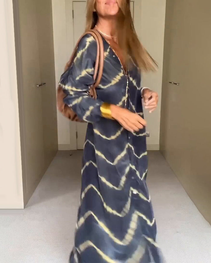 Elegant women's V-neck, full-length maxi dress. Loose and flowy, ideal for effortless summer casual wear.