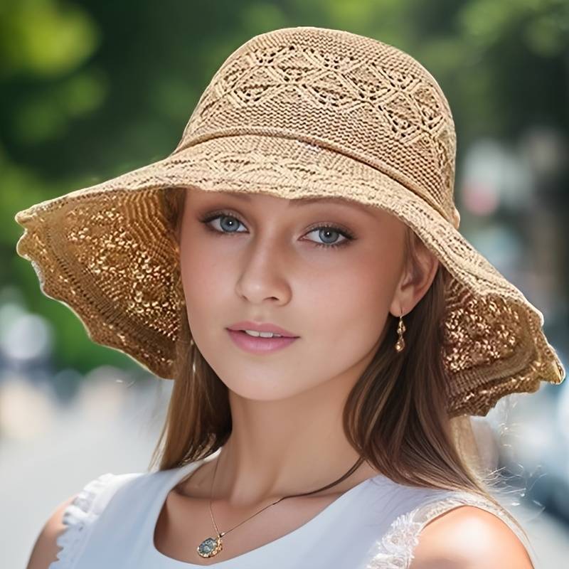 Stylish wide-brim sun hat for women, perfect for elegant headwear at the beach or during summer travel.