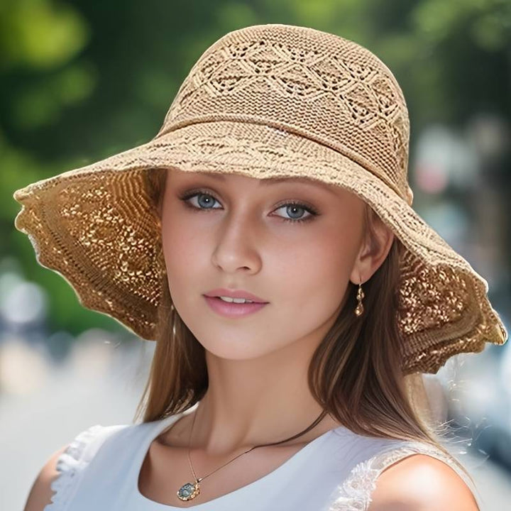 Stylish wide-brim sun hat for women, perfect for elegant headwear at the beach or during summer travel.