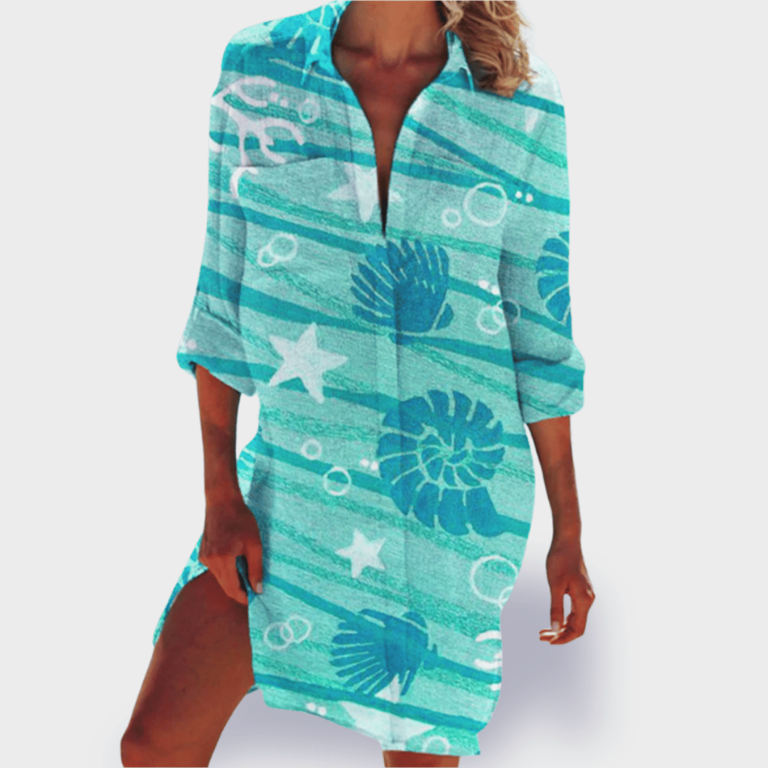 Elegant flowy women's summer dress with vibrant colors, lightweight fabric, ideal for breezy wear.