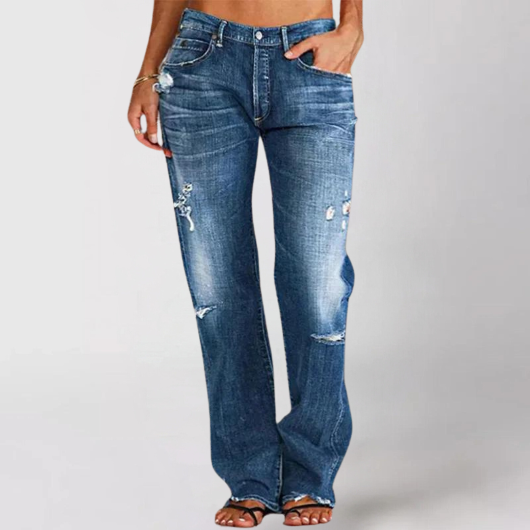 Relaxed fit women's wide-leg denim jeans. Loose, comfortable low-rise casual pants for bohemian fashion apparel.
