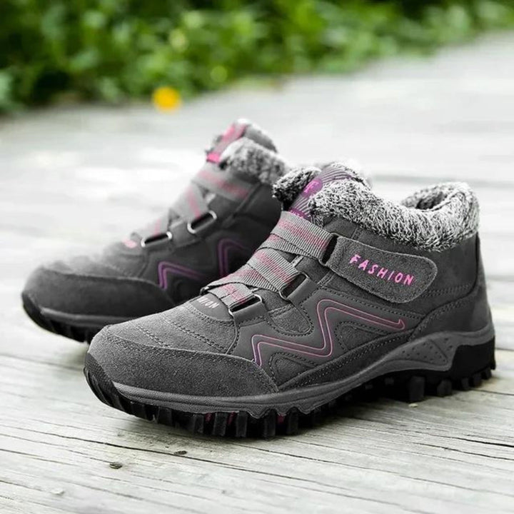 Supportive women's orthopedic winter shoes, providing comfort & foot pain relief with waterproof protection for cold walks.