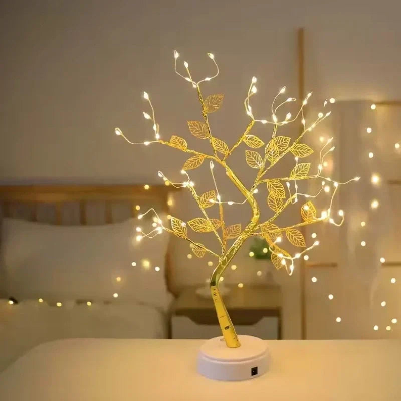 Decorative LED golden leaf bonsai tree lamp, casting warm white light to enhance your home's ambient lighting.