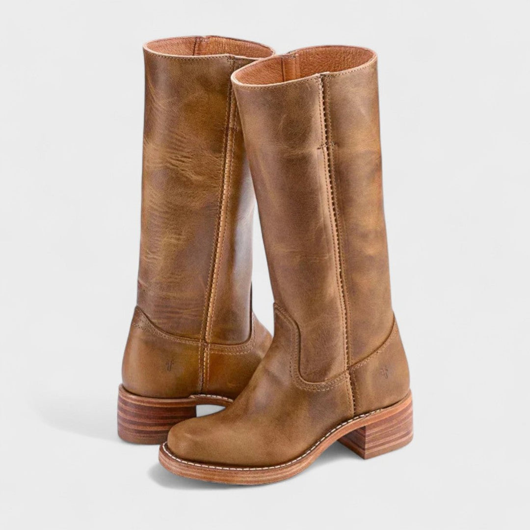 Elegant tall Western knee-high boots for women, featuring a sturdy block heel for stylish footwear.