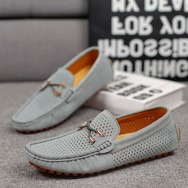 Side view of men's comfortable slip-on loafers with detailed lace and breathable construction.