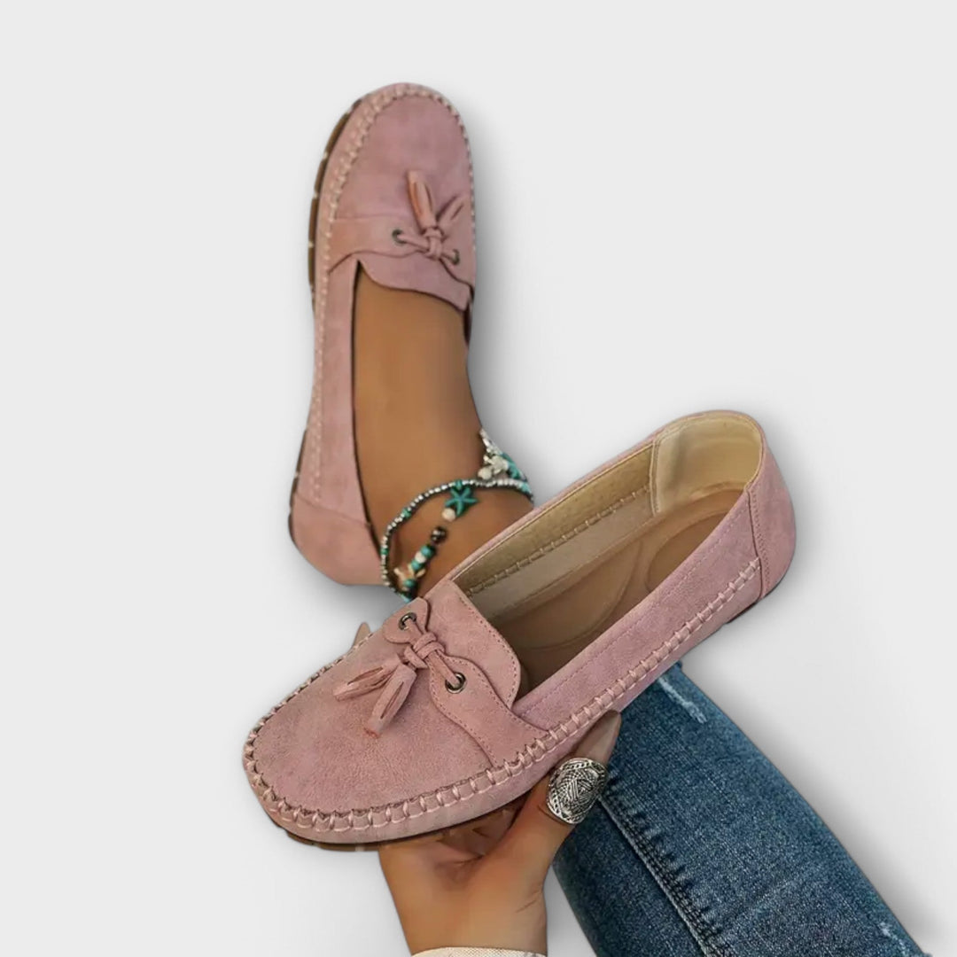 Close-up of a pair of women's cushioned orthopedic loafers, perfect for casual or professional everyday footwear.