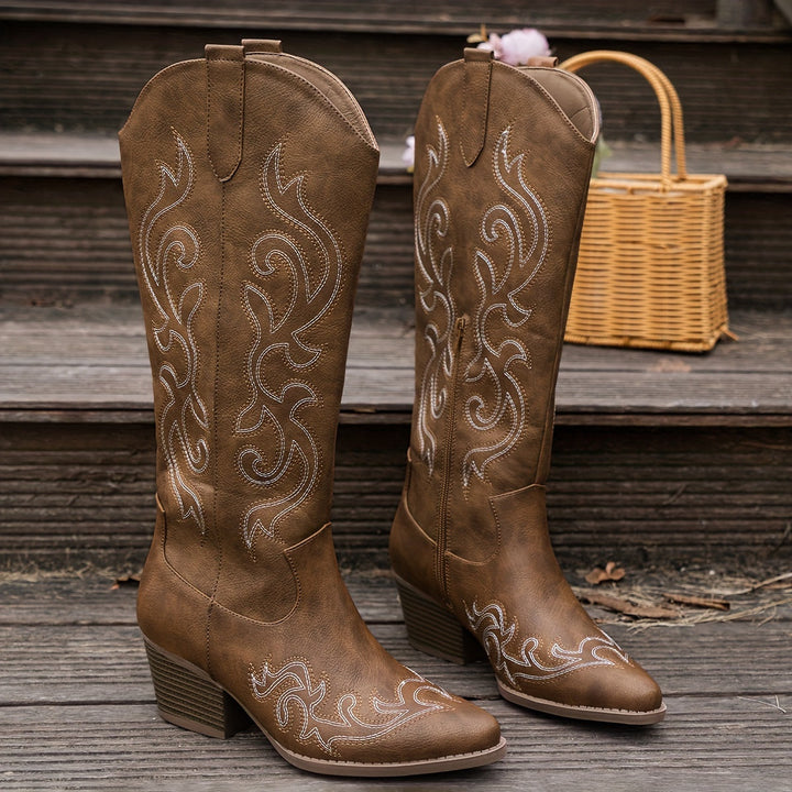 Country style women's tall boots, western embroidery, pointed toe, and sturdy block heel for any event.