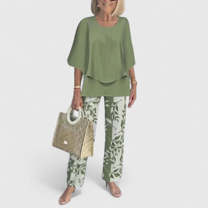 Elegant women's two-piece co-ord set with relaxed fit top & trousers, perfect for versatile day-to-night wear.