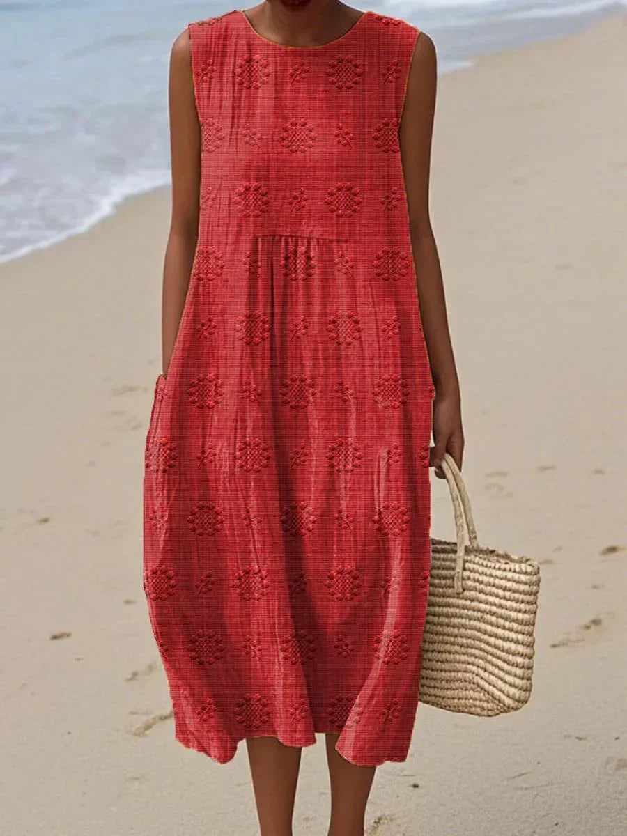 Lightweight, comfortable women's summer midi dress with elegant embroidery and practical pockets for daily wear.