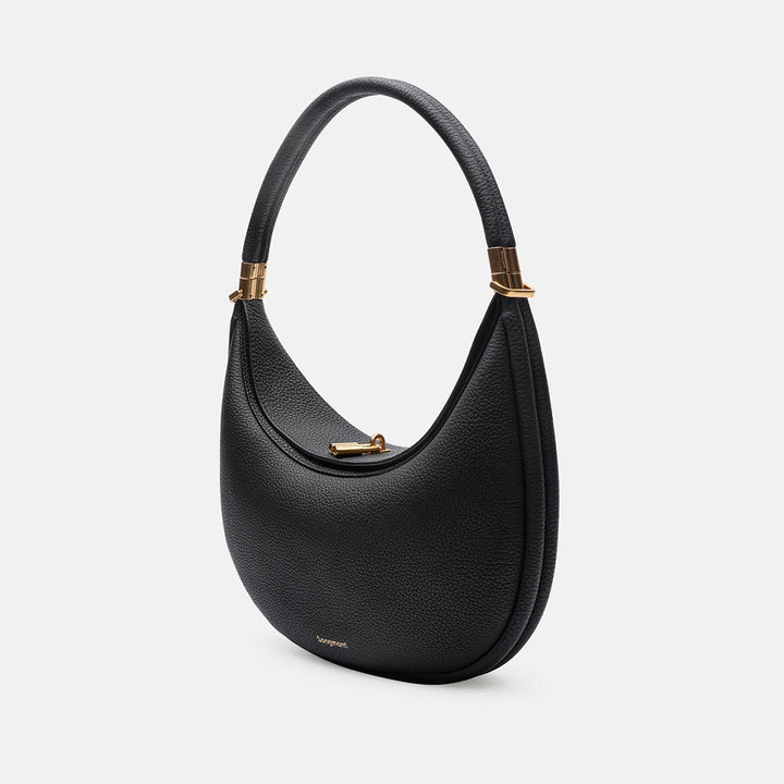 Classic black full-grain leather shoulder bag, versatile luxury handbag for women.