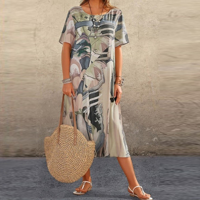 Flowy women's printed midi dress with unique artistic pattern. Effortless summer casual wear, round neck, bohemian vibe.