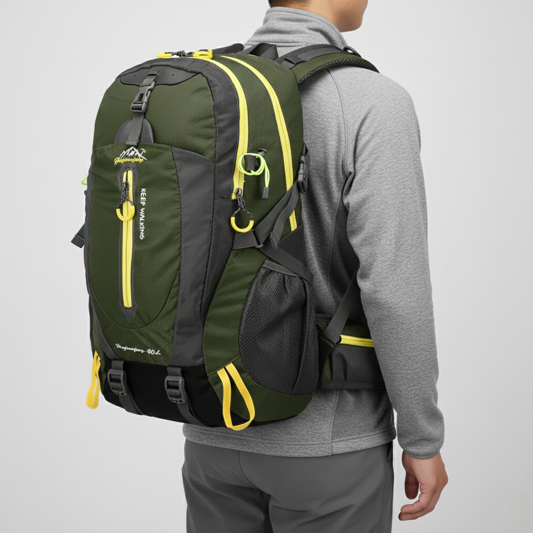 Empty 40-liter water resistant backpack showing its large capacity for hiking, travel & adventure gear, unisex design.