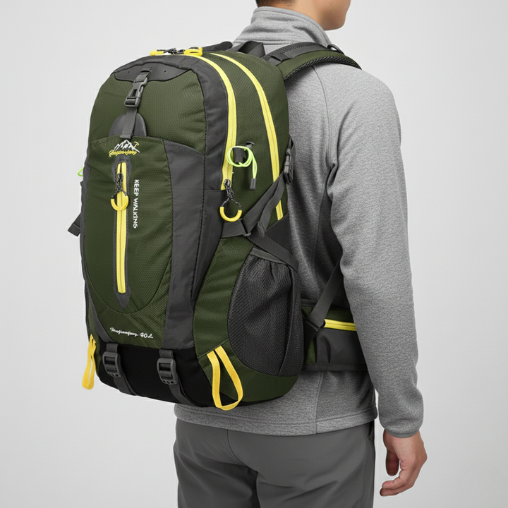 Empty 40-liter water resistant backpack showing its large capacity for hiking, travel & adventure gear, unisex design.