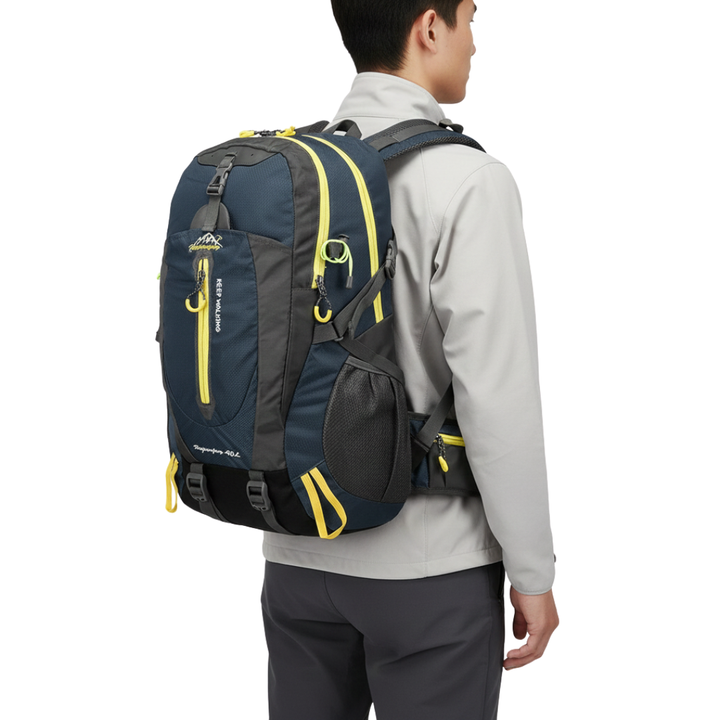 40-liter water resistant backpack with hiking poles attached, ready for an outdoor adventure; unisex durable travel gear.