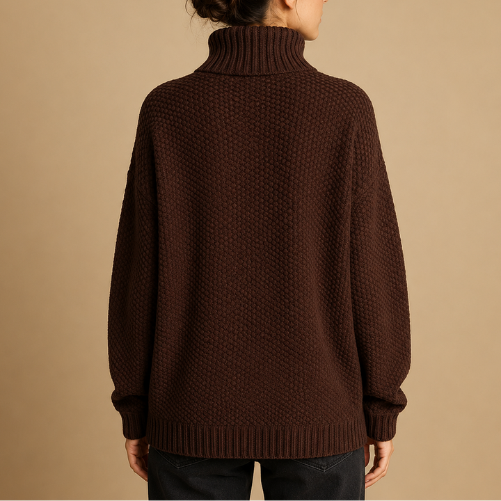 Women's long-sleeve turtleneck sweater, a timeless elegant top for versatile fashion.