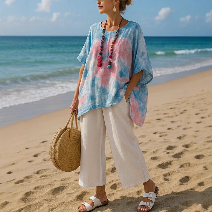 Stylish royal blue asymmetric summer tunic top for women, a flowy & relaxed fit for casual and beach wear.