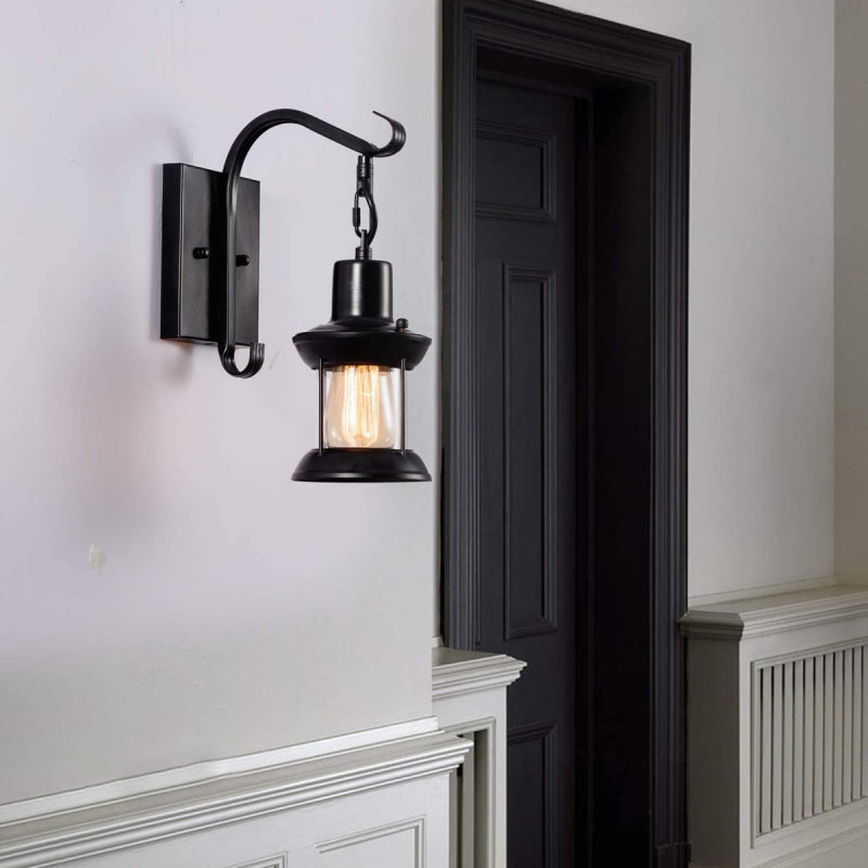 Black industrial wall light, vintage aesthetic, ideal for accentuating interior decor.