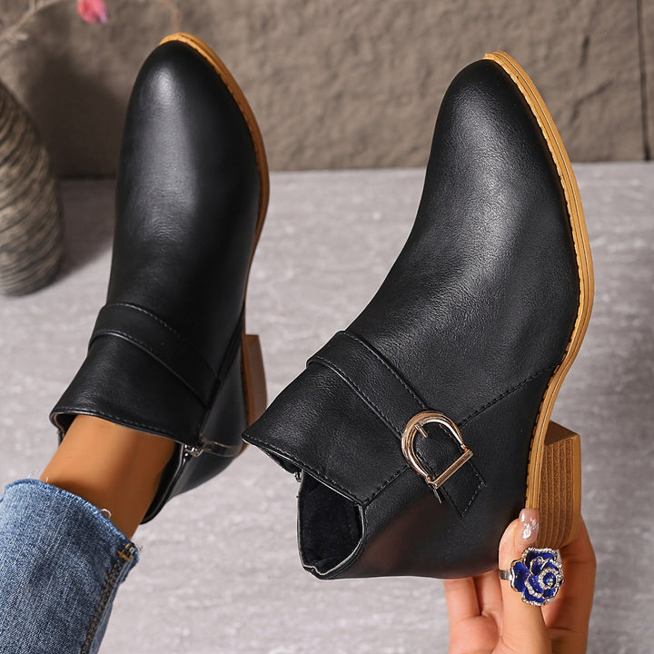 Stylish brown Chelsea ankle boots for women, featuring a modern buckle, round toe, and everyday wear comfort.