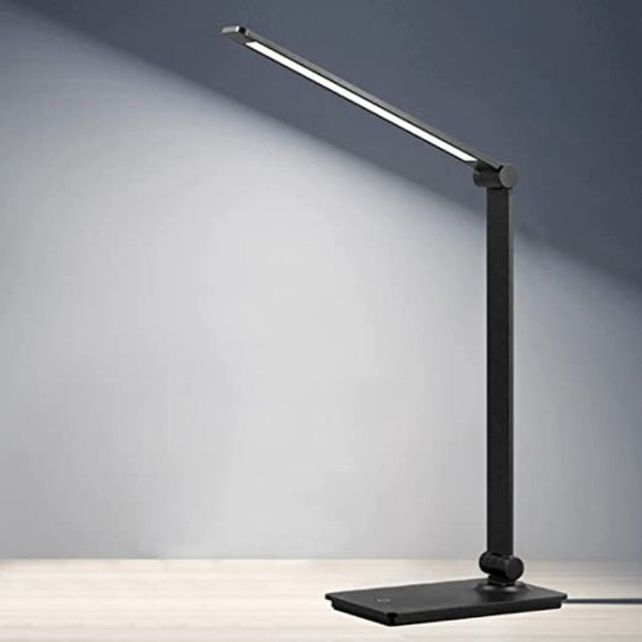 Foldable LED desk lamp with touch control, dimmable light, and adjustable arm. Perfect for office & home.