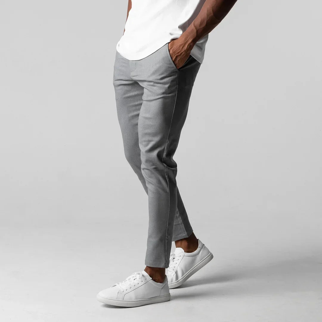 Navy men's versatile stretch chinos, a comfortable choice for casual or active wear.