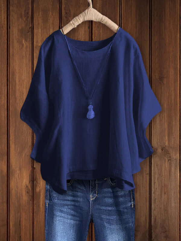 Women's Effortless Crew-Neck Dolman-Sleeve Tunic Top. Comfortable, relaxed fit for versatile casual everyday style.