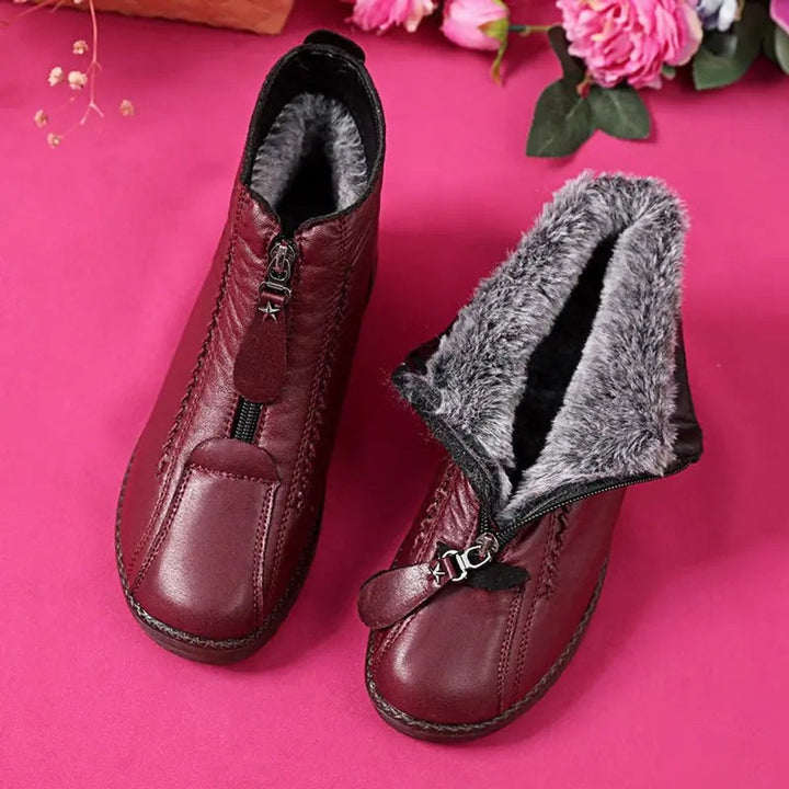 Women's warm ankle boots for winter. Cozy, slip-resistant design offers comfort & protection in cold weather.