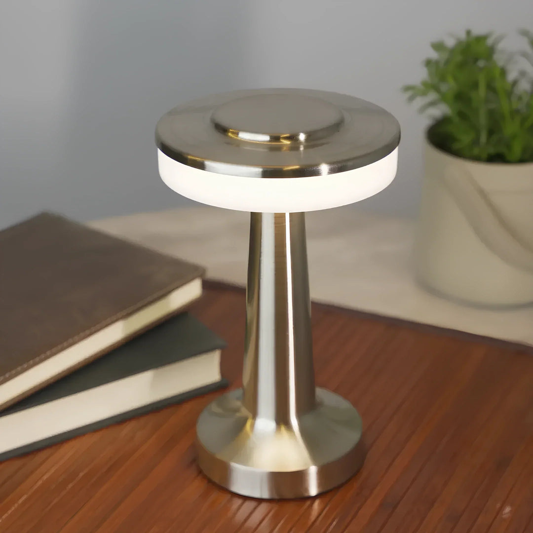 Metallic retro LED lamp, cordless & rechargeable. Stylish accent for tables, bars & home decor.
