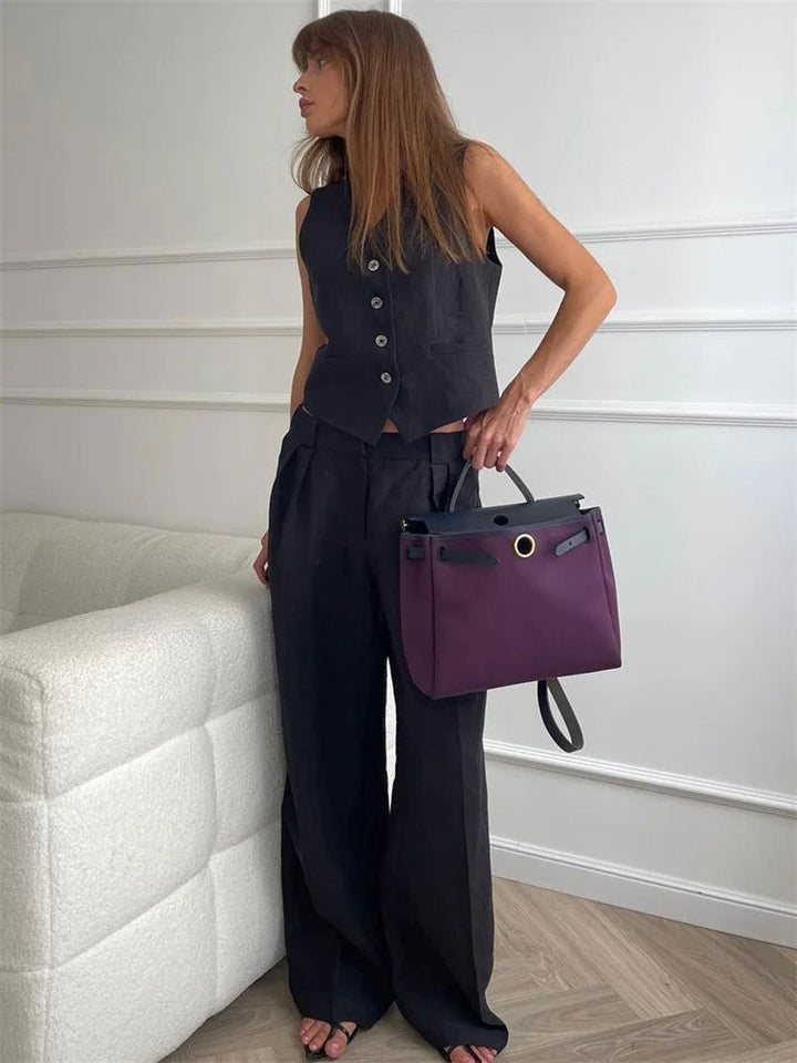 Women's elegant two-piece set: Vest and pleated wide-leg pants, offering a stylish, comfortable silhouette.