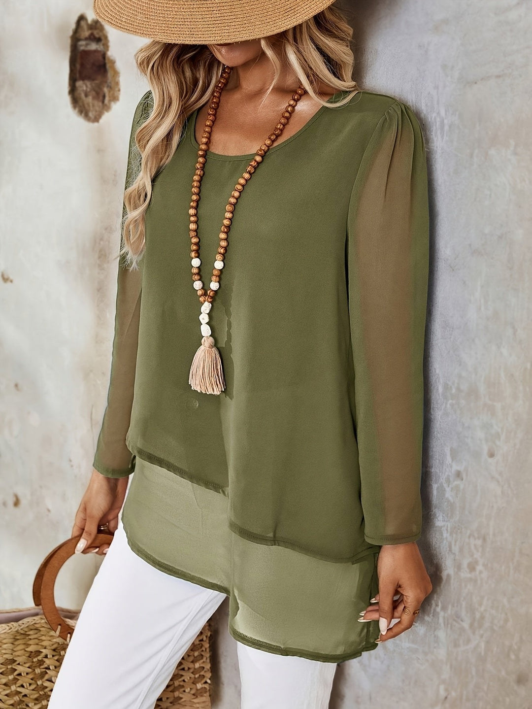 Green flowing layered top, a women's relaxed fit blouse for effortless casual chic.
